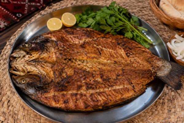 Masgouf: Iraq’s Ancient Riverside Grilled Fish